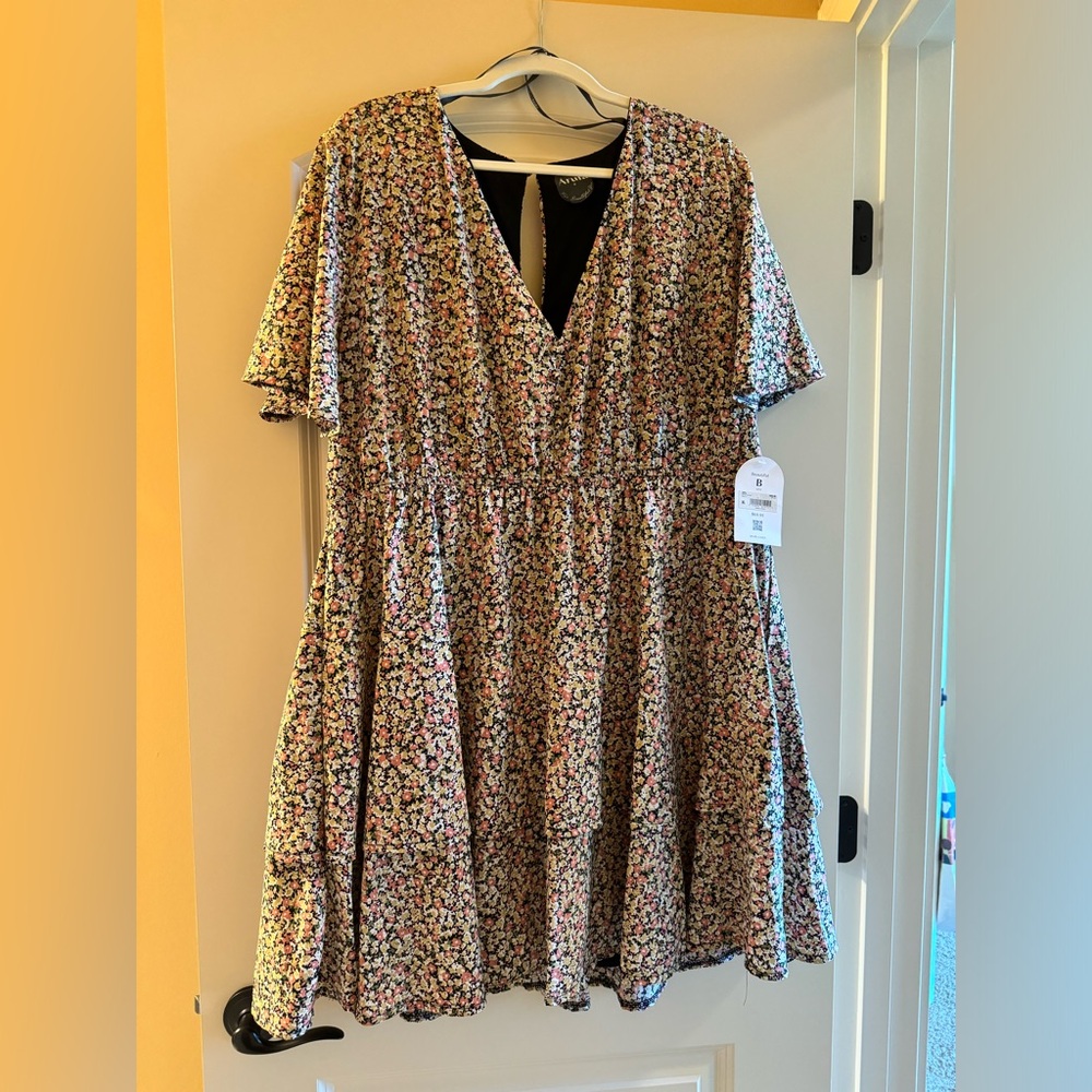 Floral mini dress with sleeves from Arula by Altar’d State